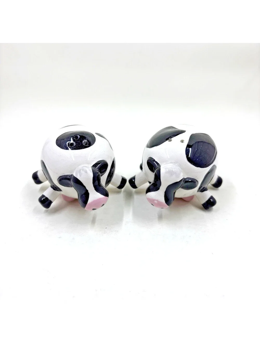 Farmhouse Style Mini Cow Salt and Pepper Shakers Resting on Utters 2.5